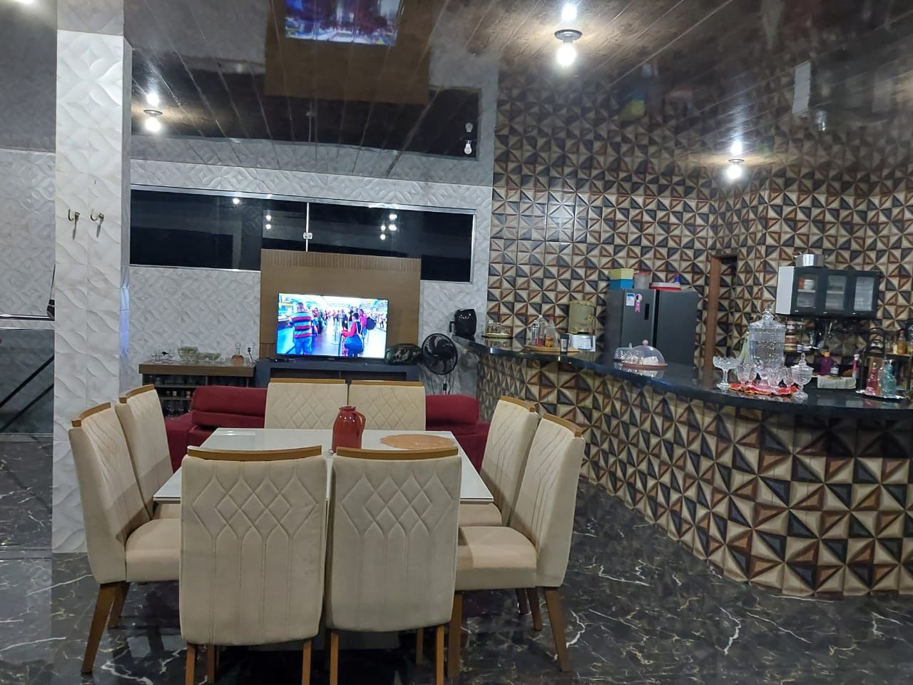 Sala de estar e área de café da manhã da Pousada Caribe de Alter